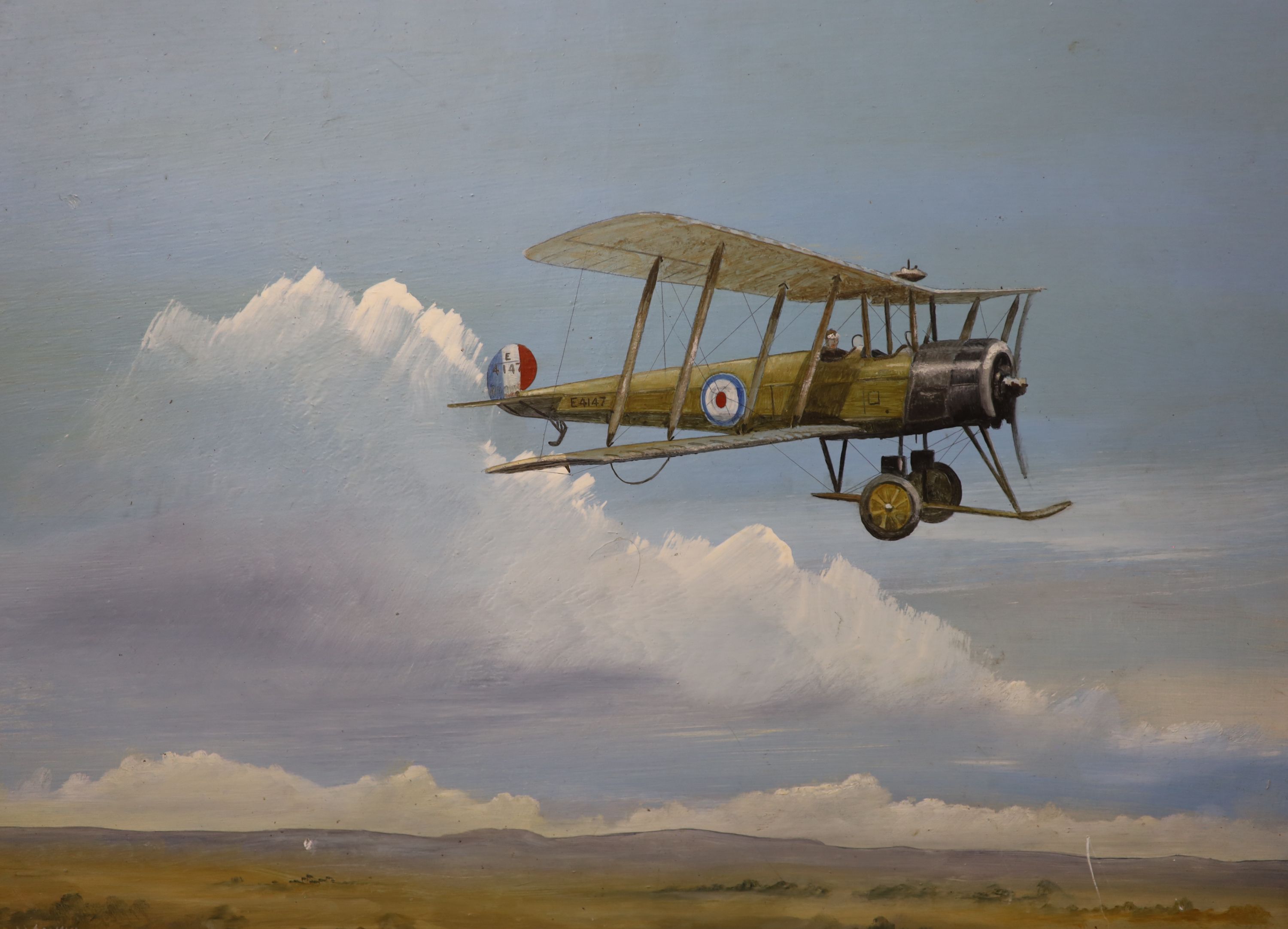 W.J. Gaskin, oil on board, WWI bi-plane in flight, signed, 36 x 44cm